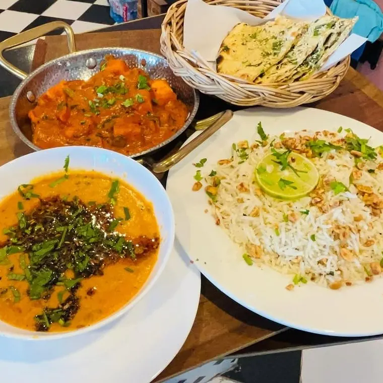 Govinda's thali platter with curry, dal, jeera rice and naan
