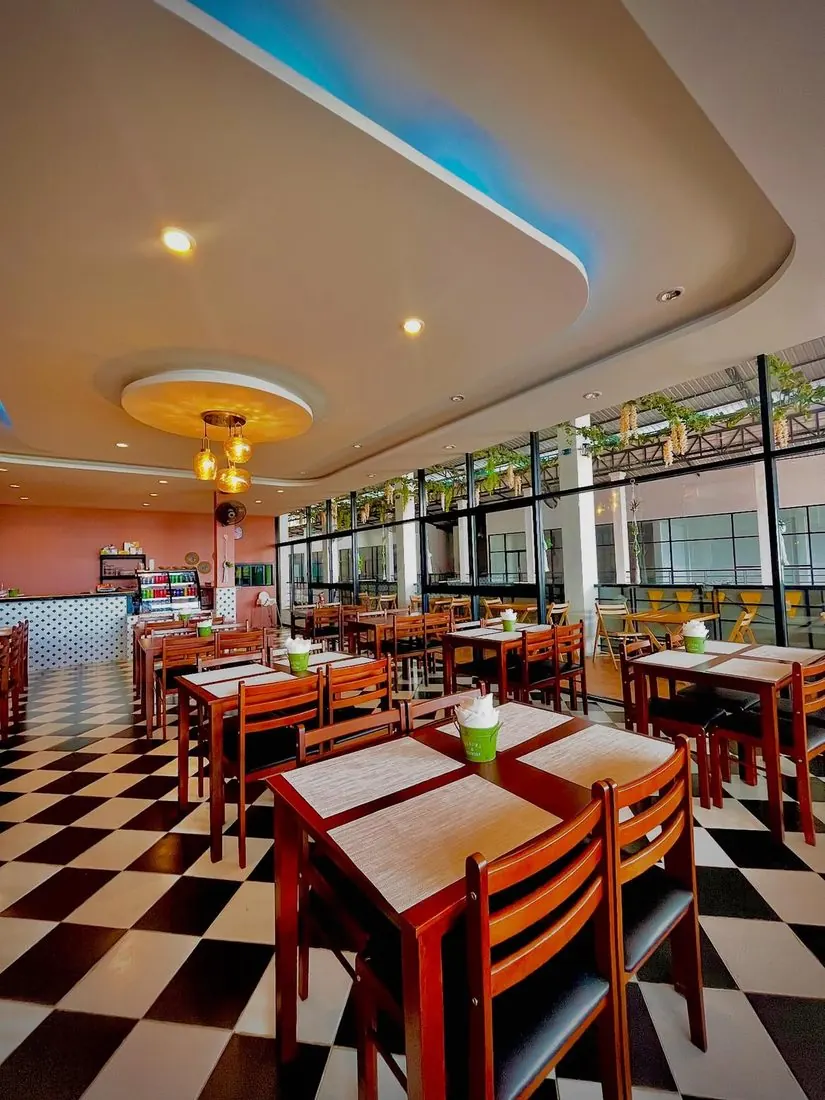 Govinda's empty dining room with checkerboard floor