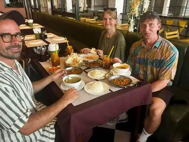 Happy customers enjoying their meal at Govinda's